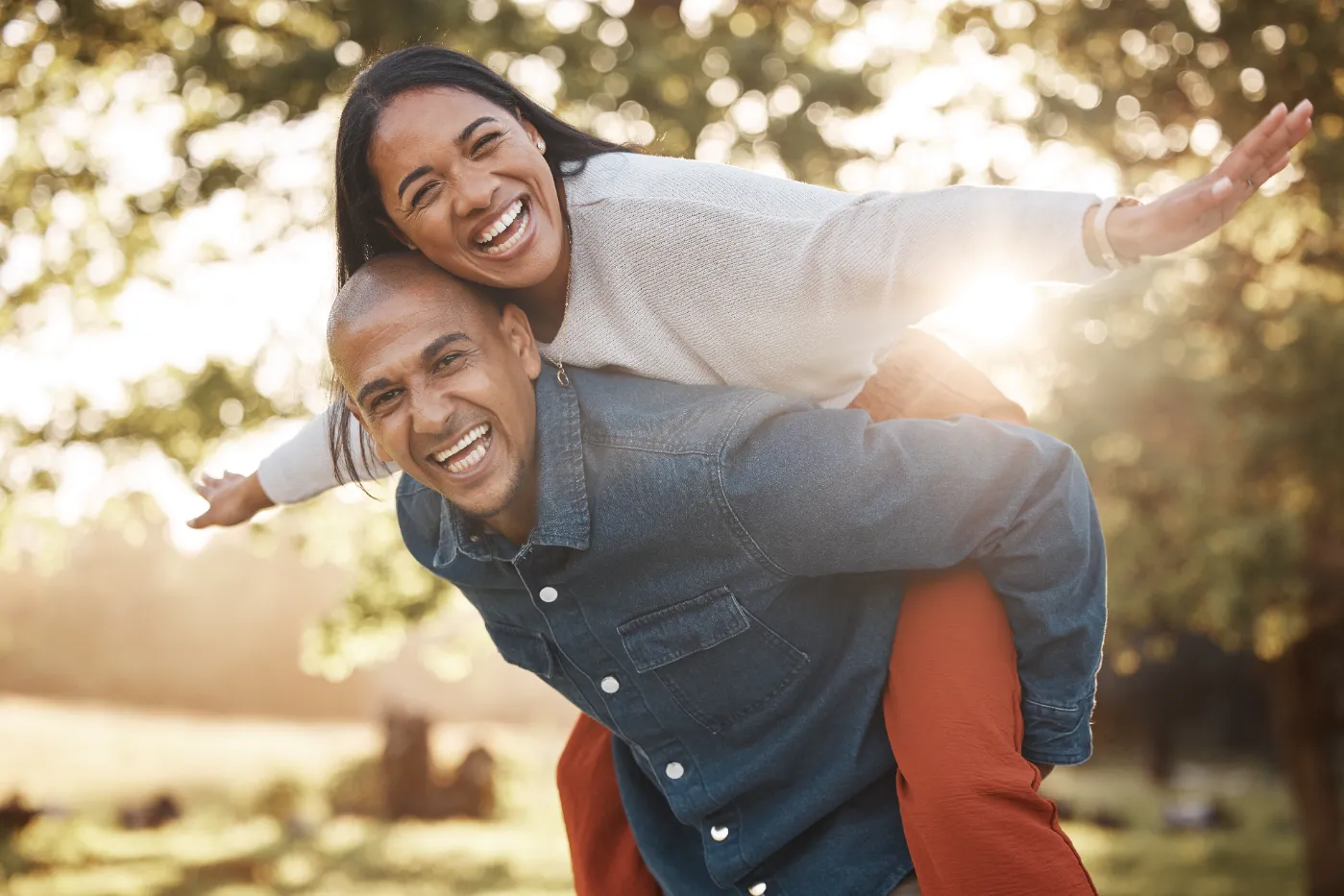 couple-park-and-happy-with-piggy-back-portrait-a-2026-03-25-02-20-42-utc